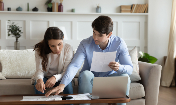 Couple reviewing finances at home