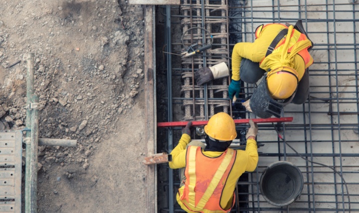 An aerial view of construction workers.