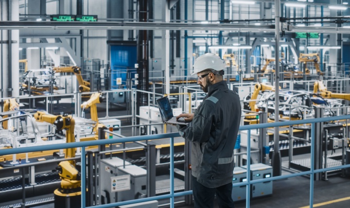 A worker in a car factory.