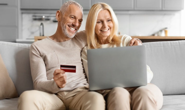 Happy couple shopping online