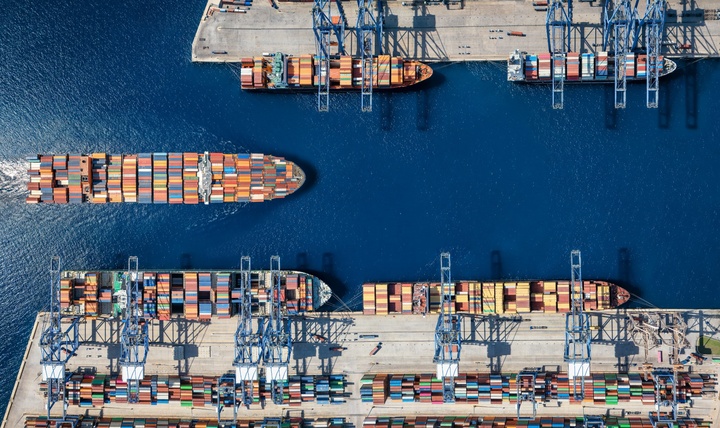 An aerial view of a cargo ship harbour.