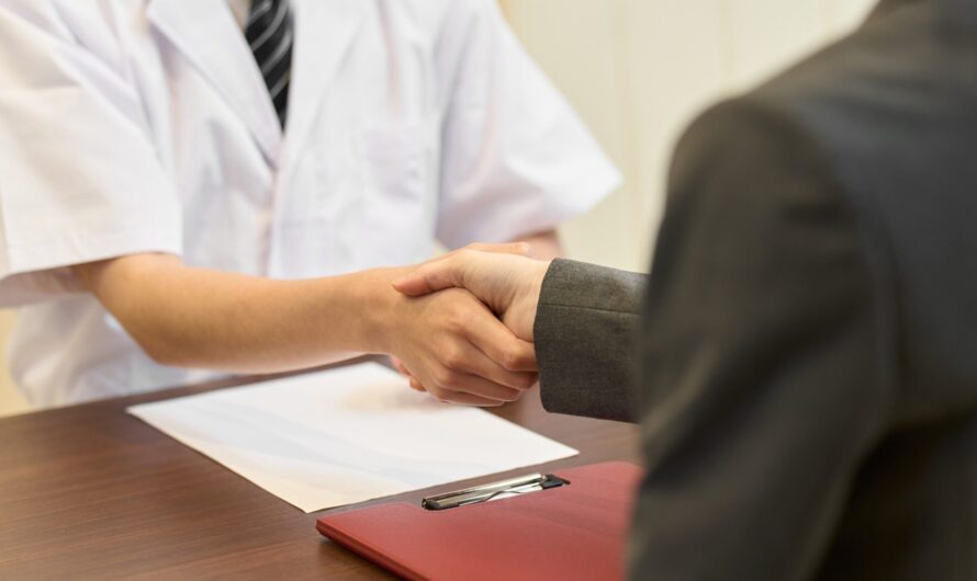 Two people shaking hands.